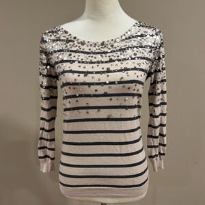 The Limited Cream sweater with black stripes and silver sequin detailing